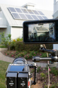RED Komodo filming house with solar panels for SunFarm Energy.